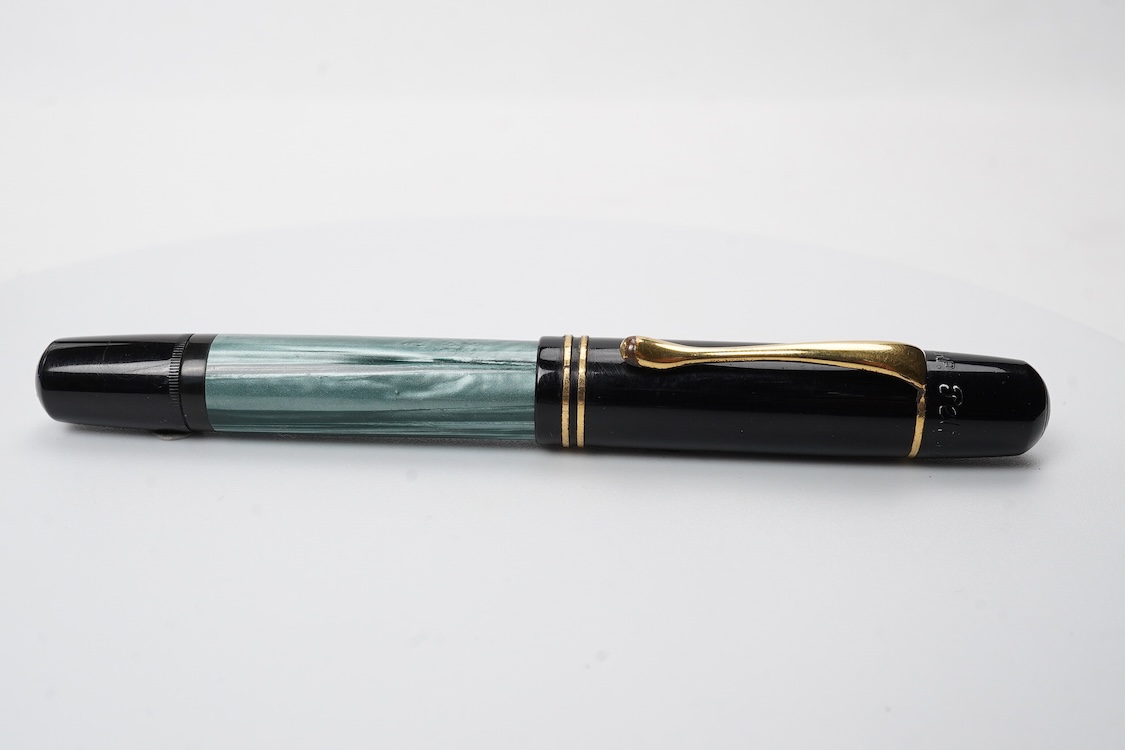 A Pelikan 100N fountain pen fitted with a 14ct. gold Pelikan nib